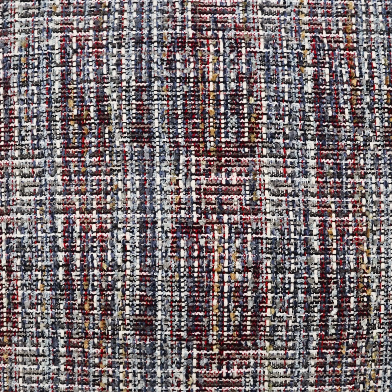 Textured woven tweed fabric with blue, gray, white, red and brown threads; ideal for upholstery.