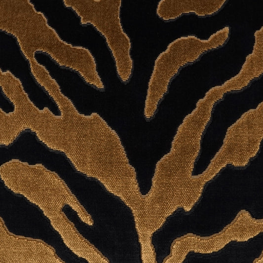 Black fabric with bold irregular gold tiger-stripe pattern and textured metallic embroidery.