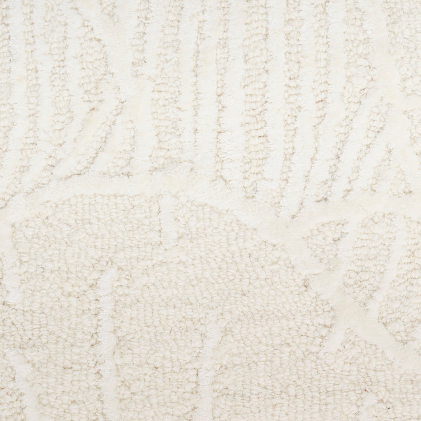 Cream-toned textured rug with geometric pattern, loop-pile weave, soft beige for modern living spaces.