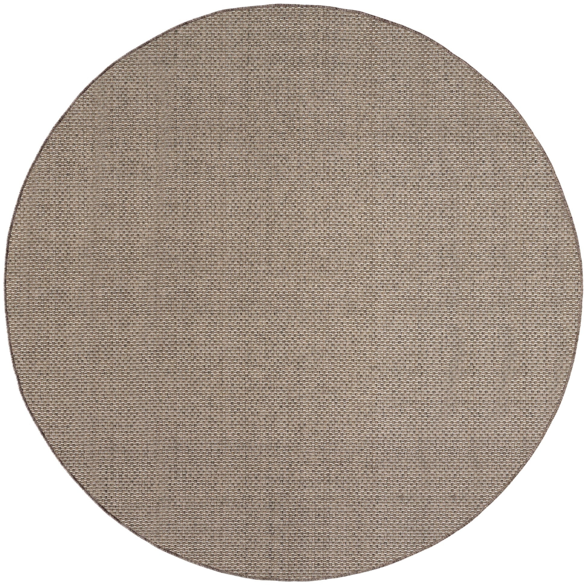 Round natural jute rug with a tight weave in warm beige for outdoor use.