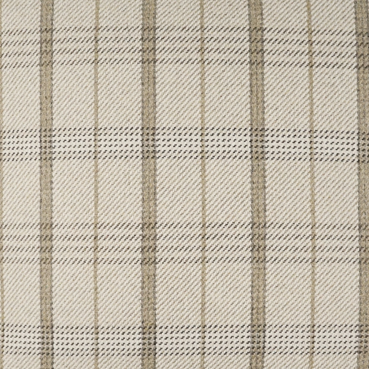 Beige plaid fabric with brown vertical and horizontal stripes, woven textile.