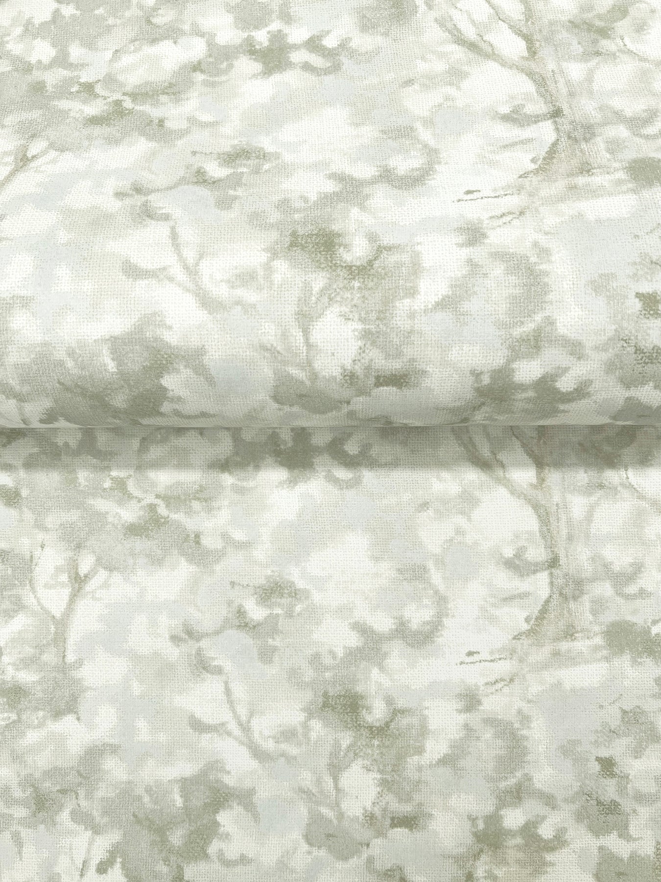 Muted sage-gray tree-branch pattern on soft fabric; linen-like texture for upholstery or drapery.