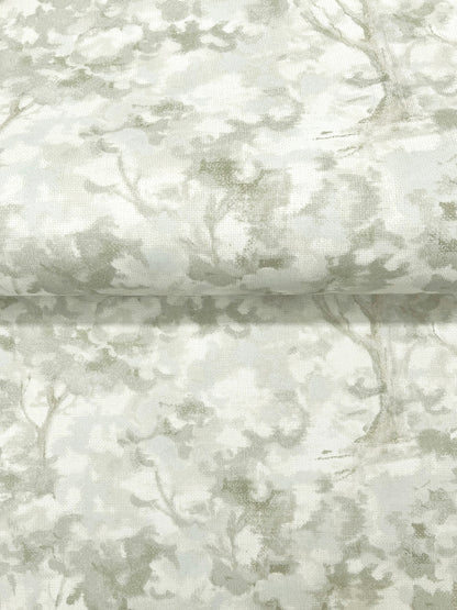 Muted sage-gray tree-branch pattern on soft fabric; linen-like texture for upholstery or drapery.