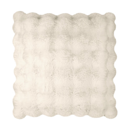 Ivory faux fur pillow, square 24" x 24", plush solid texture for cozy living room decor.