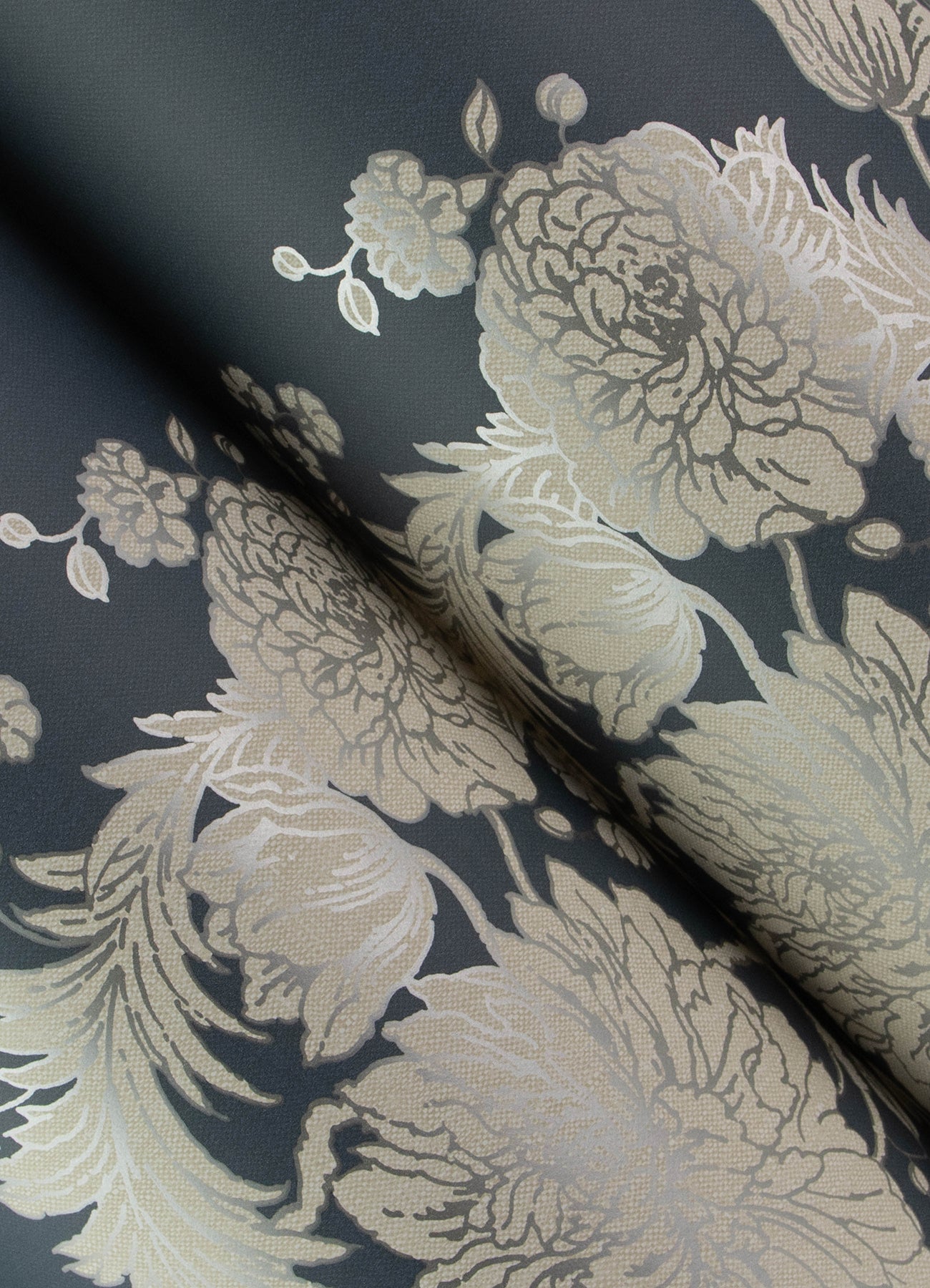 Dark navy satin with ivory floral damask pattern and large blossoms; elegant upholstery or drapery fabric.