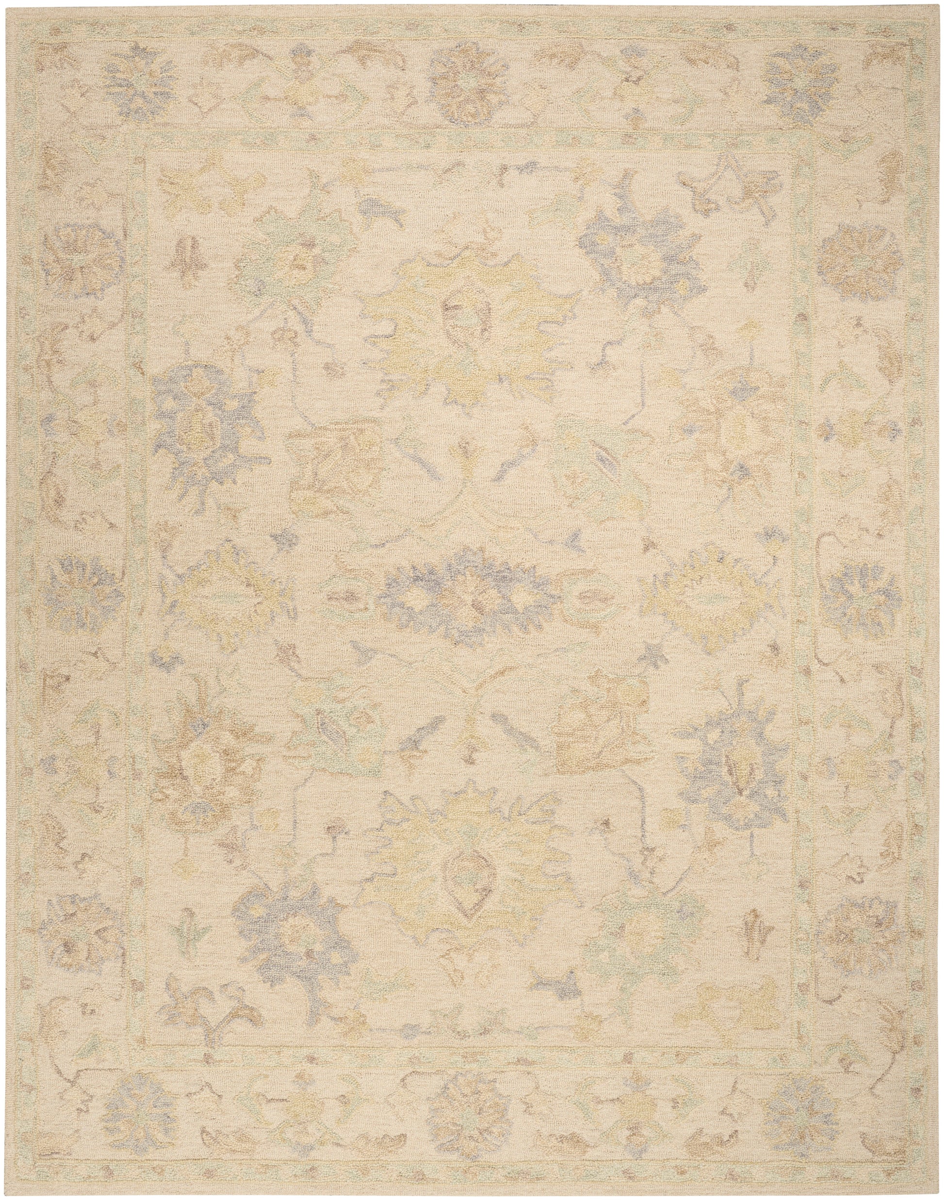 Pastel antique-style Oriental rug with cream base and pale yellow, blue, and green floral motifs and a decorative border.