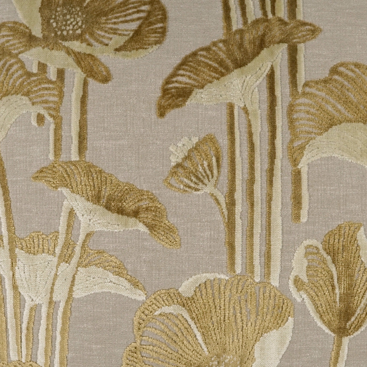 Beige linen-like fabric with a gold botanical pattern of tall stems and fan-shaped flowers; jacquard-woven textile.