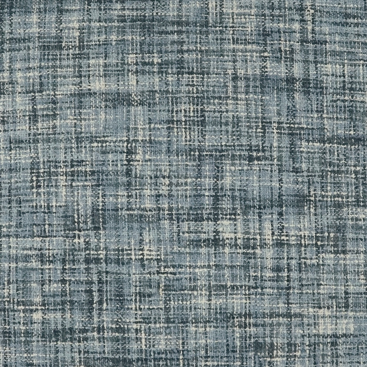 Blue and beige plaid woven fabric texture with a grid-like pattern.