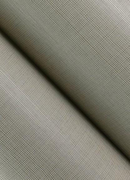 Beige textured woven fabric close-up with fine grid pattern; soft upholstery or apparel material.