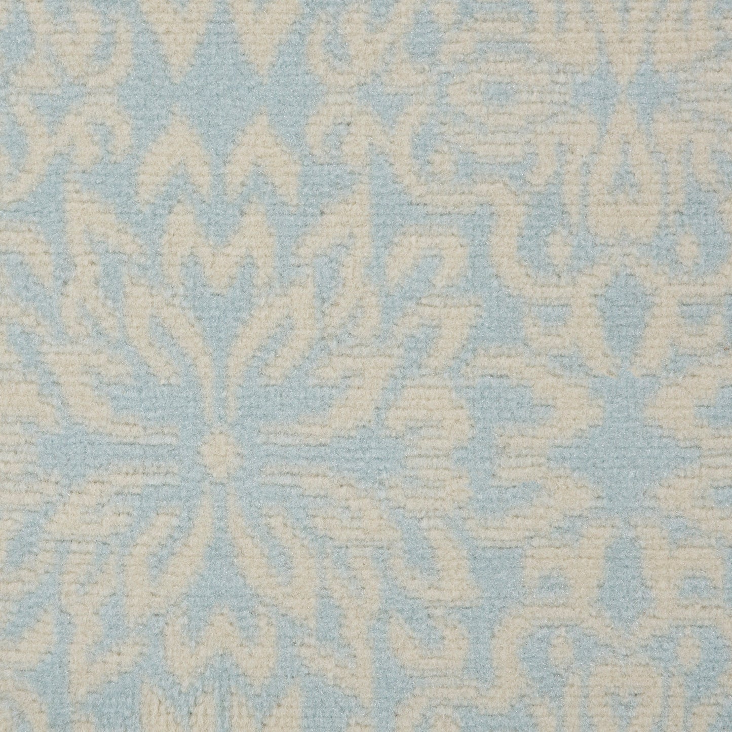 Soft blue and ivory damask-patterned woven fabric with floral motifs; decorative upholstery or drapery textile.