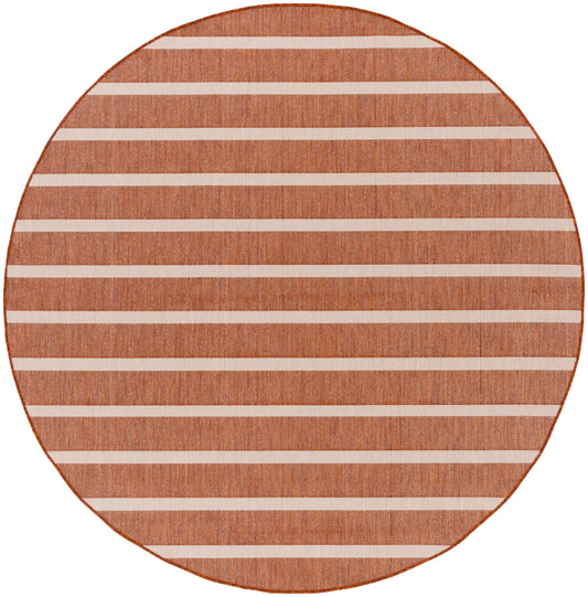 Round orange-brown jute rug with light beige horizontal stripes; casual coastal style.