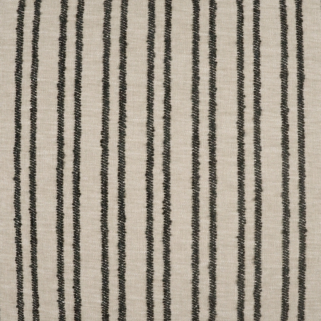 Beige pillow with a newsprint striped pattern, 24 x 24 inches.