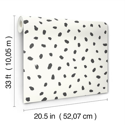 Roll of white wallpaper with black animal spots in a polka-dot pattern, 33 ft long by 20.5 in wide.