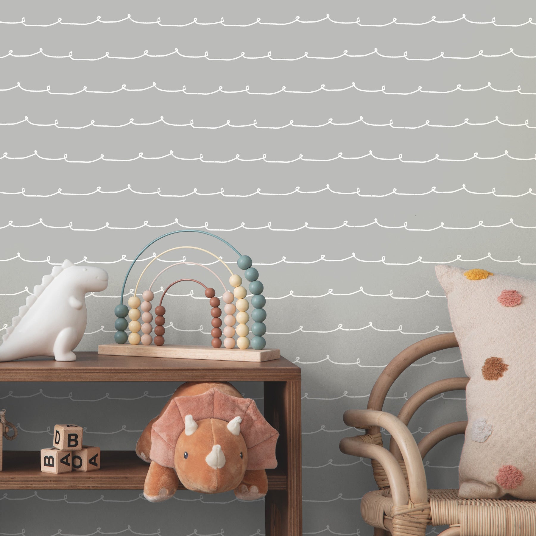 Whimsical grey stripe wallpaper with wiggle-line graphics.