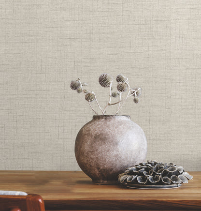 Room scene showing light grey faux-fabric wallpaper graphics on the walls.