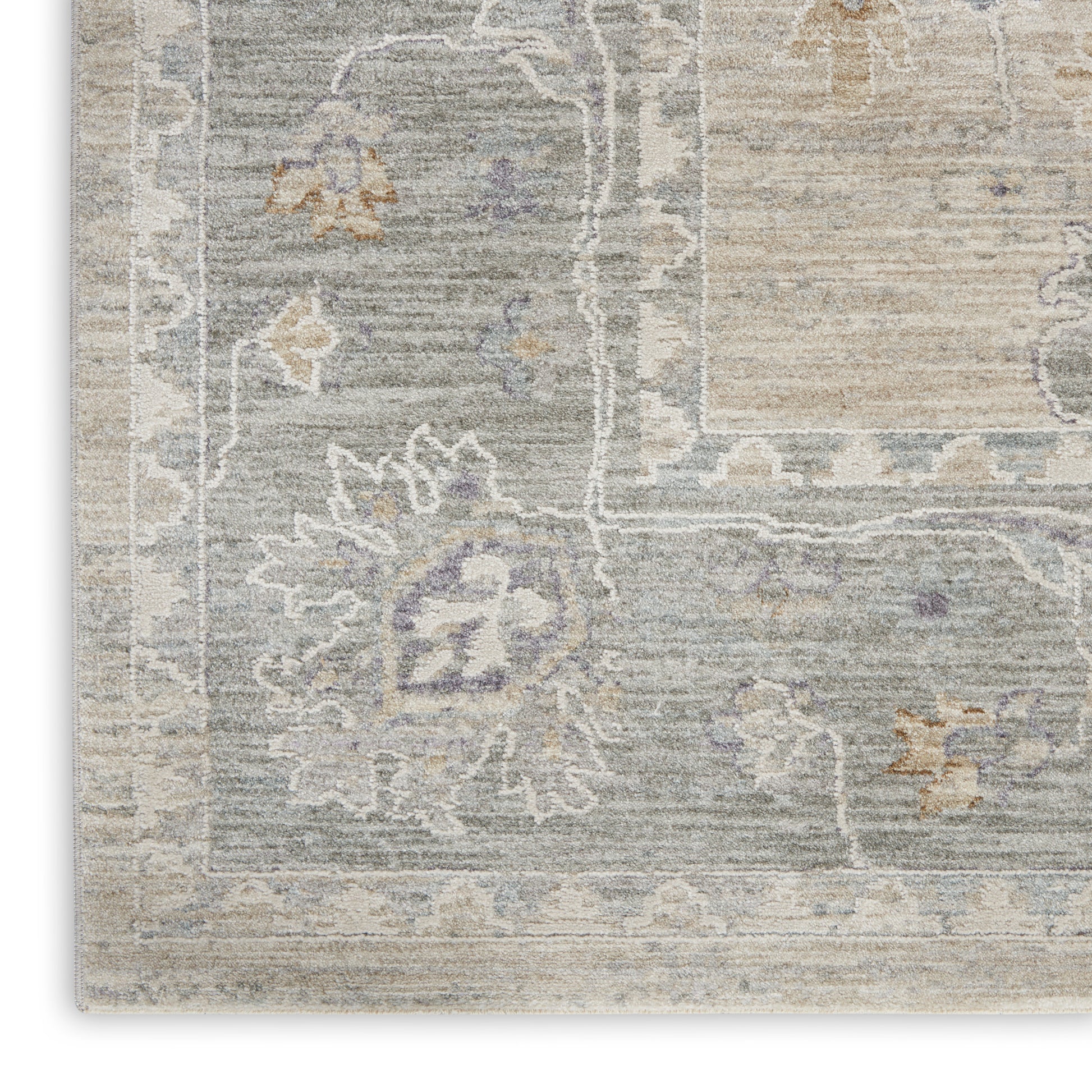 Vintage-style rug in gray-blue & beige with an ivory border & subtle lavender floral motifs.