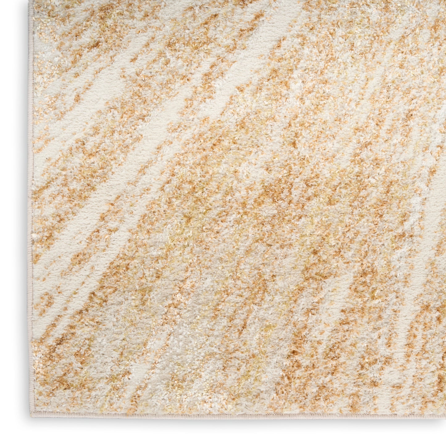 Beige and cream rug with a marble-like pattern, featuring diagonal tan veining and a speckled texture.