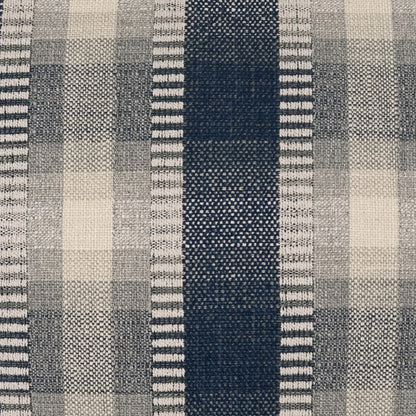 Indigo plaid pillow featuring grey and white plaid with a bold navy center stripe and alternating light-gray bands.