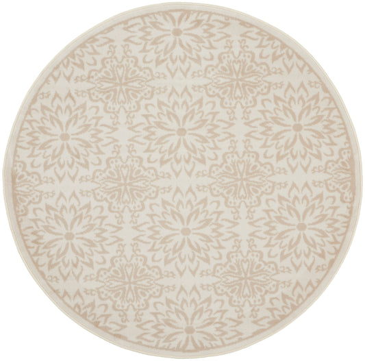 Round beige rug with cream floral medallion pattern; soft woven texture, neutral decor accent.