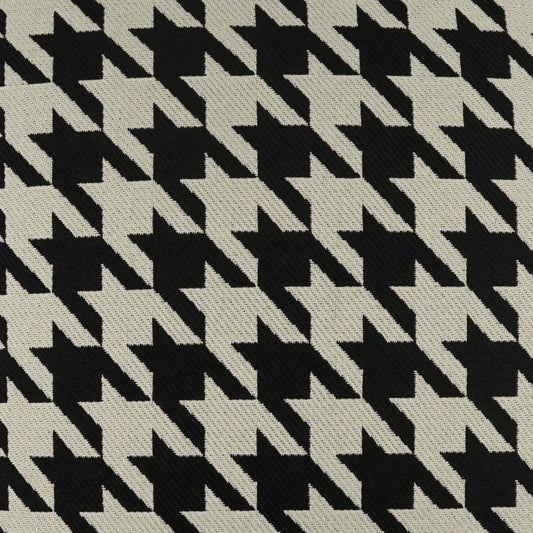 Black and white houndstooth woven fabric pattern.