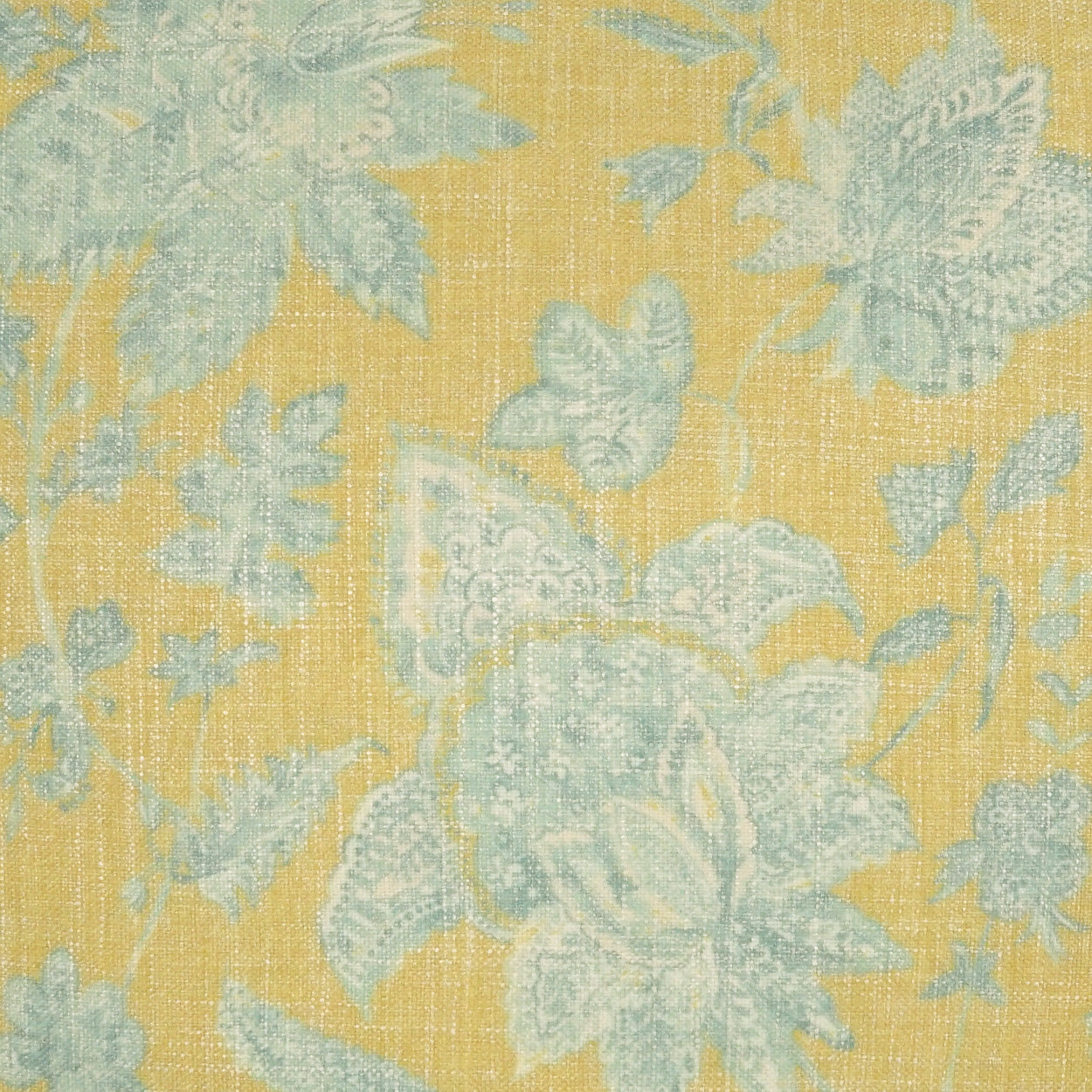 Yellow pillow with pale blue damask floral pattern and woven texture; 24 x 24.