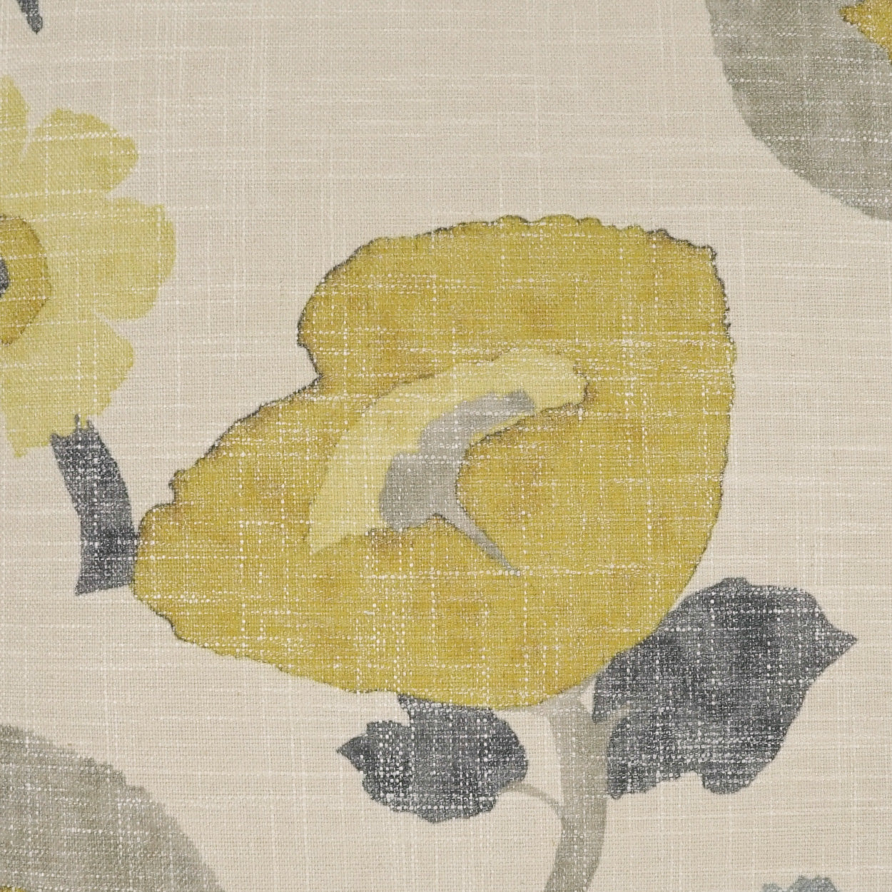 Beige textured pillow with a large yellow poppy and gray-green leaves; floral print.