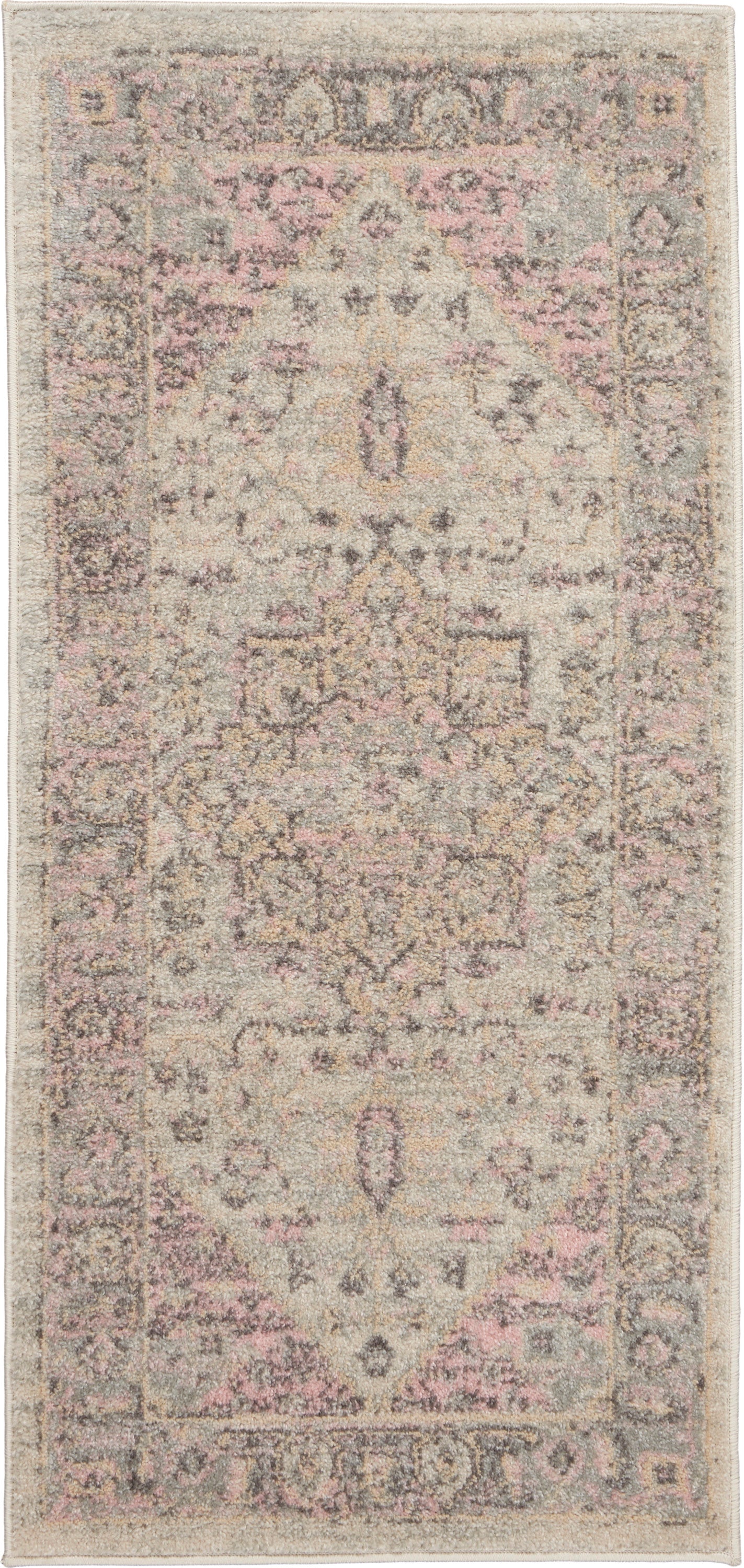 Rectangular distressed rug with pale pink, cream and gray tones; vintage-inspired oriental medallion border and motif.