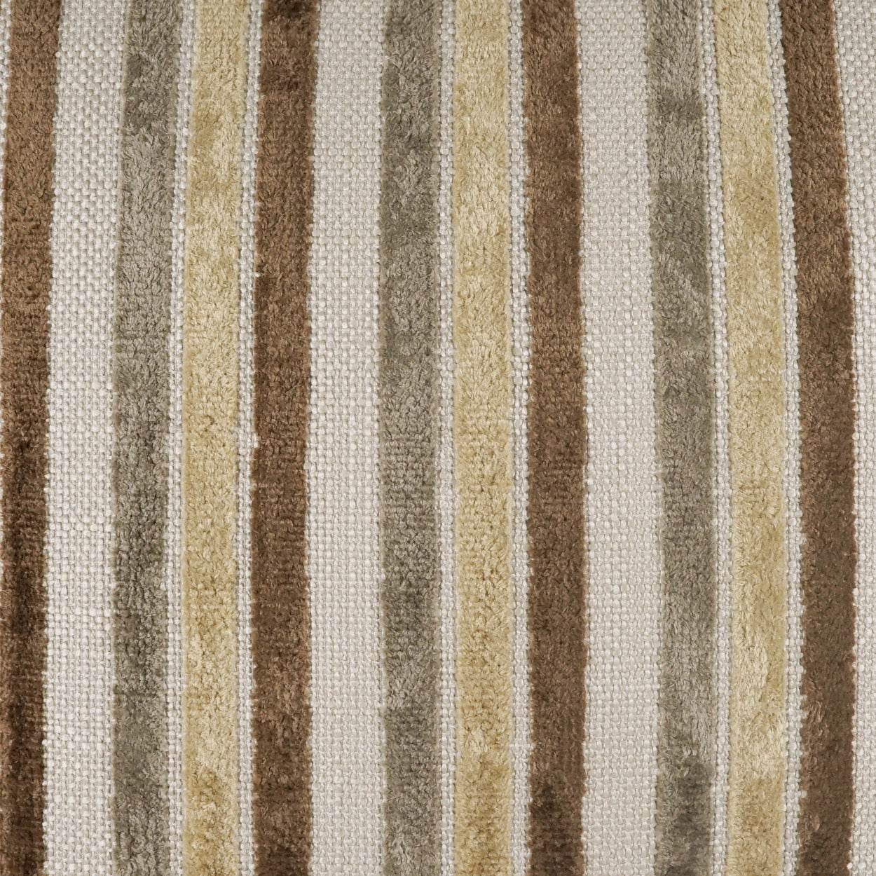 Vertical striped woven fabric in beige, tan, brown and gray tones; textured textile suitable for rug or upholstery.