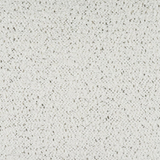 Cream-beige fabric close-up with speckled, nubby texture; soft, neutral upholstery material.
