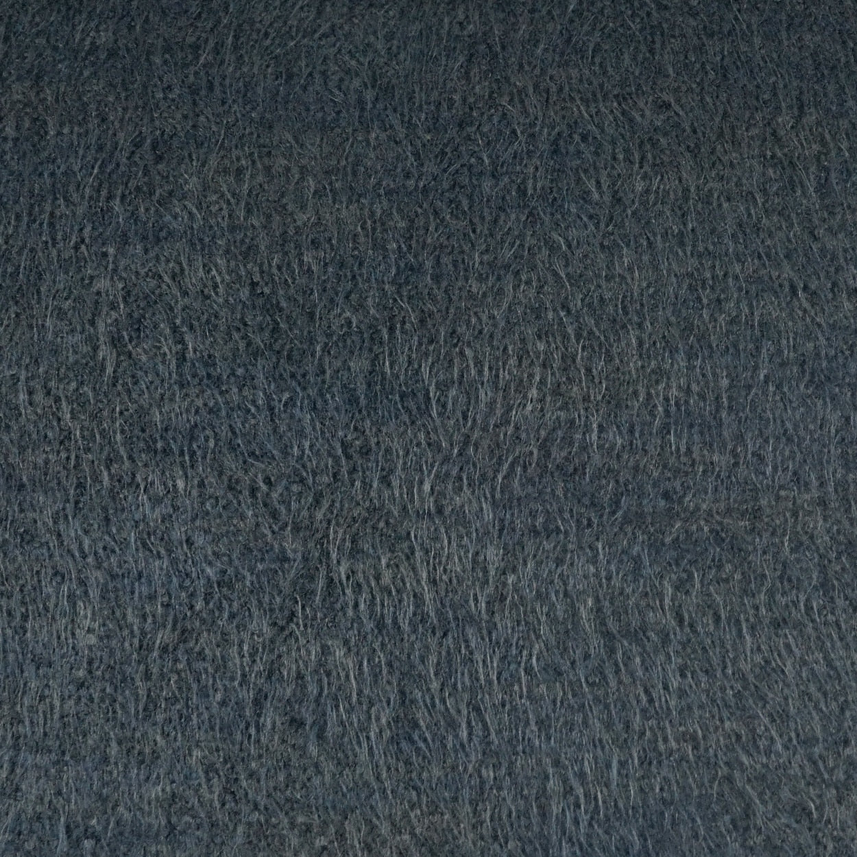 Dark navy fabric swatch with rough textured border along bottom and right; smooth matte surface.