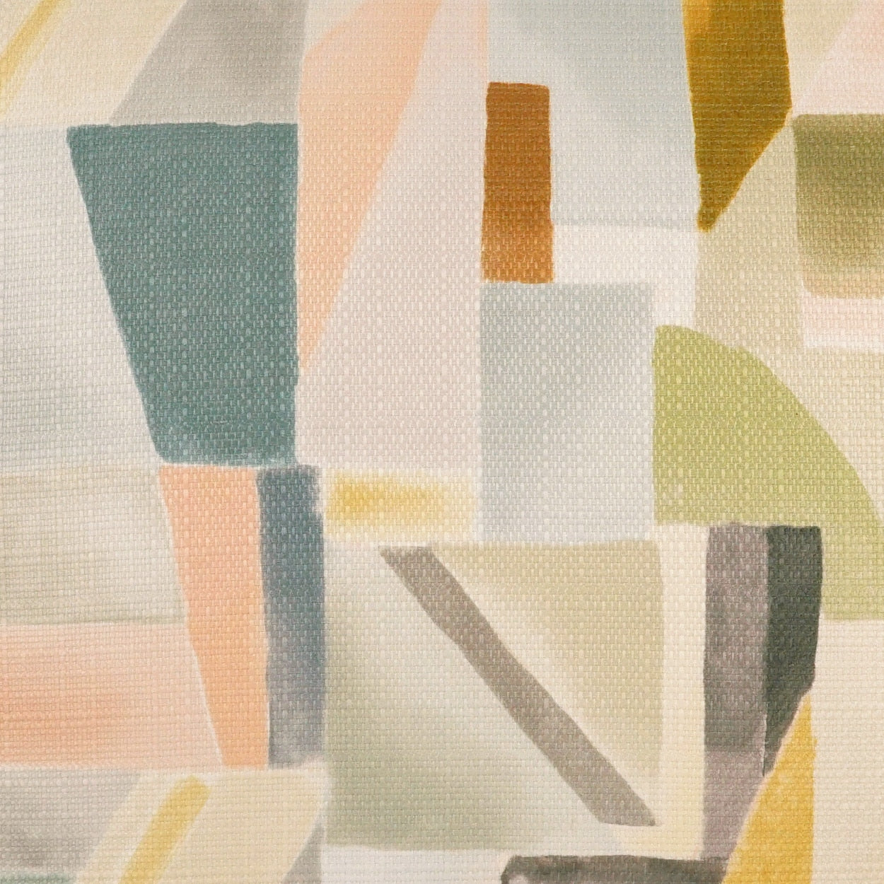 Abstract geometric fabric print with pastel blocks of teal, peach, beige, yellow & grey on a woven canvas.