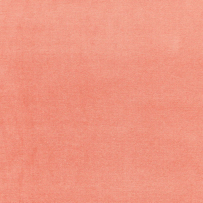 Peach knit fabric texture with subtle weave, soft casual textile.