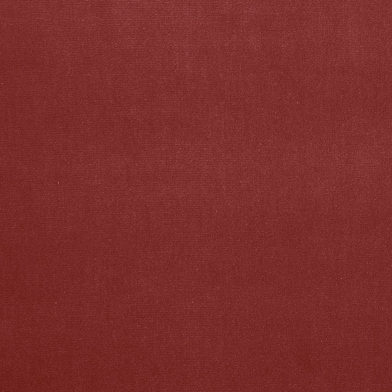 Deep burgundy velvet texture close-up with subtle weave and matte finish.