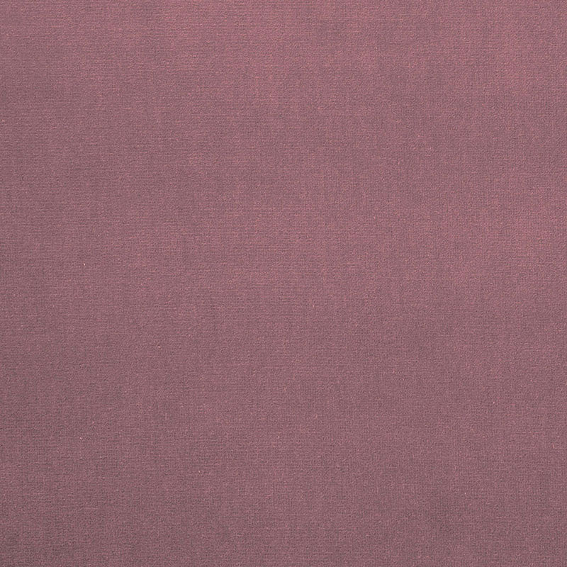 Dusty mauve purple velvet texture with a soft nap and plush pile; matte finish, great for upholstery, drapery, or apparel.