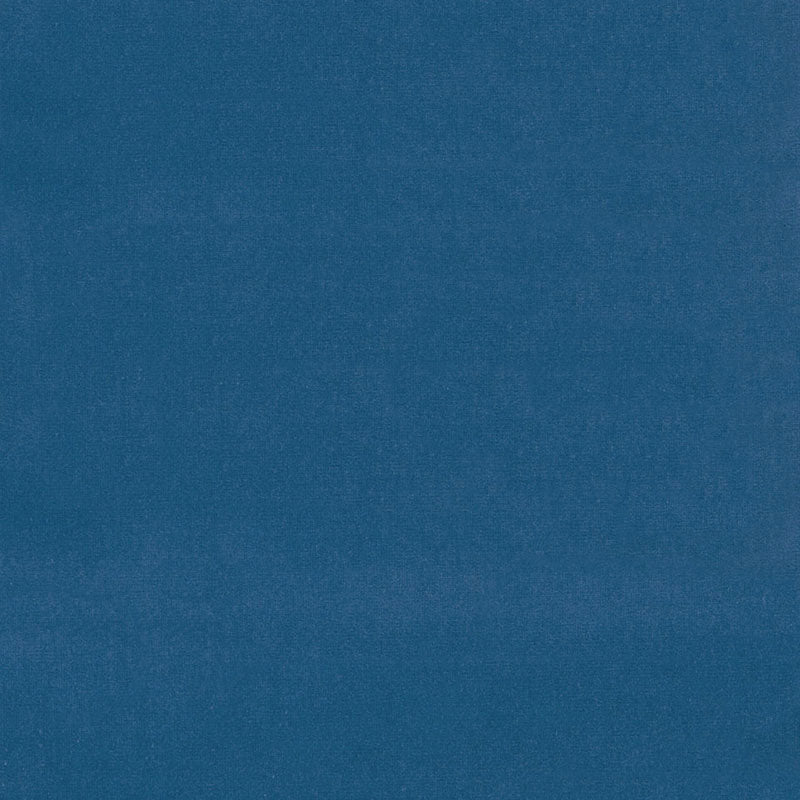 Blue velvet fabric swatch with soft texture and subtle sheen, ideal for upholstery or crafts.