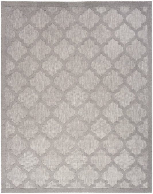 Rectangular rug in soft gray and ivory with a repeating trellis/quatrefoil pattern; modern classic area rug, 9' x 12'.