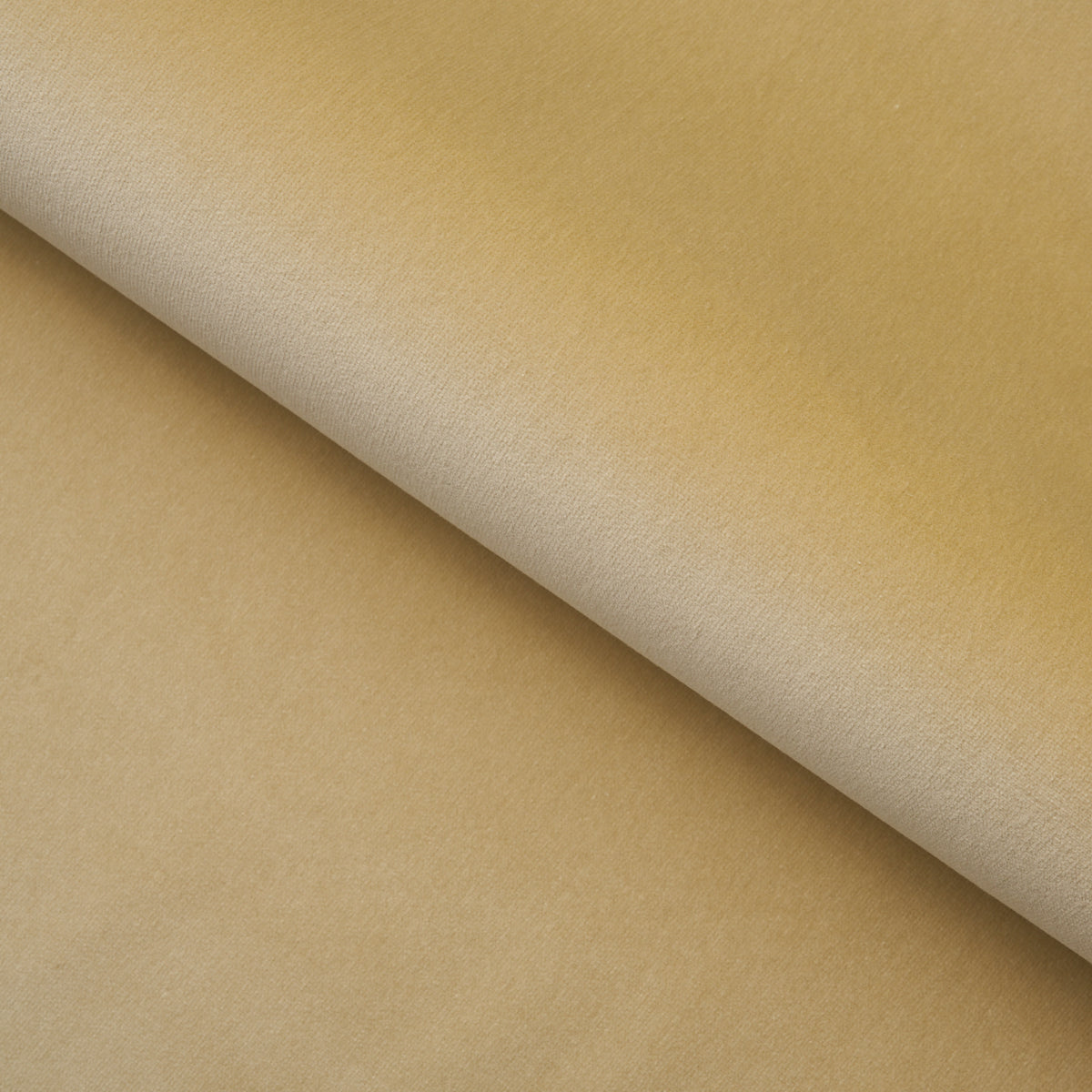 Beige fabric swatch with a diagonal fold and rolled edge; soft, smooth textile suitable for upholstery or crafts.