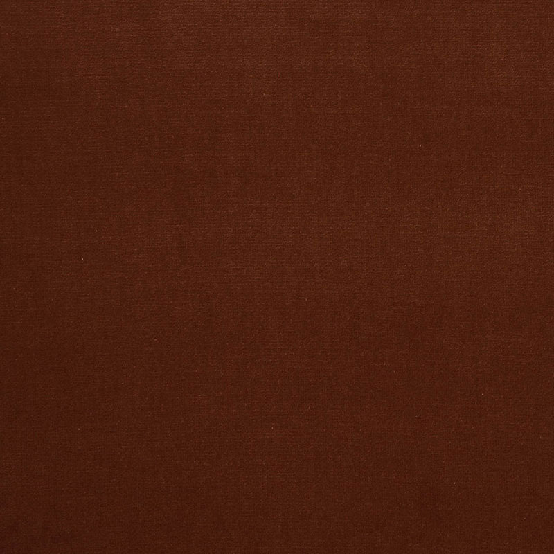 Dark brown velvet fabric texture close-up with a smooth nap.