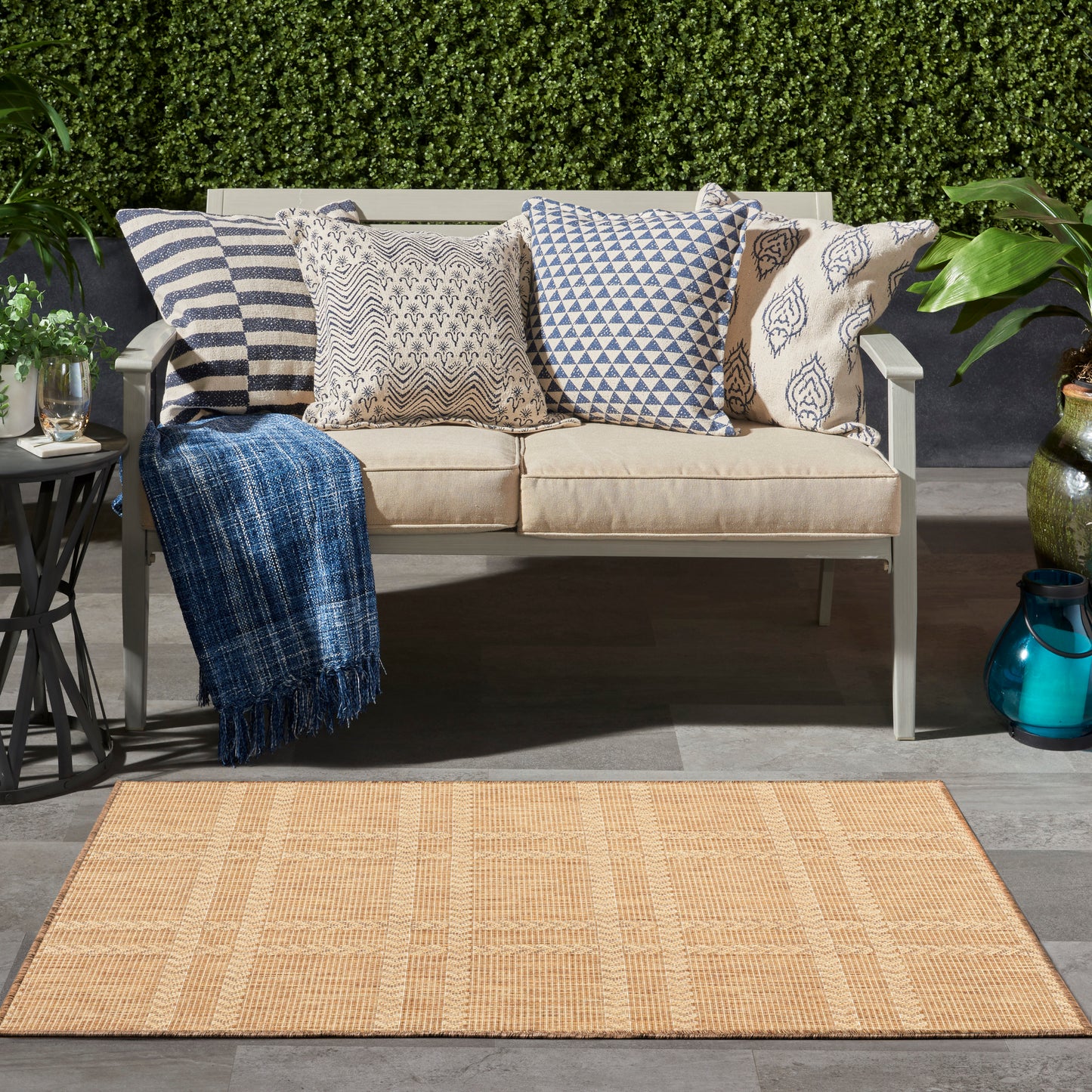 Modern 3' x 5' beige woven rug.