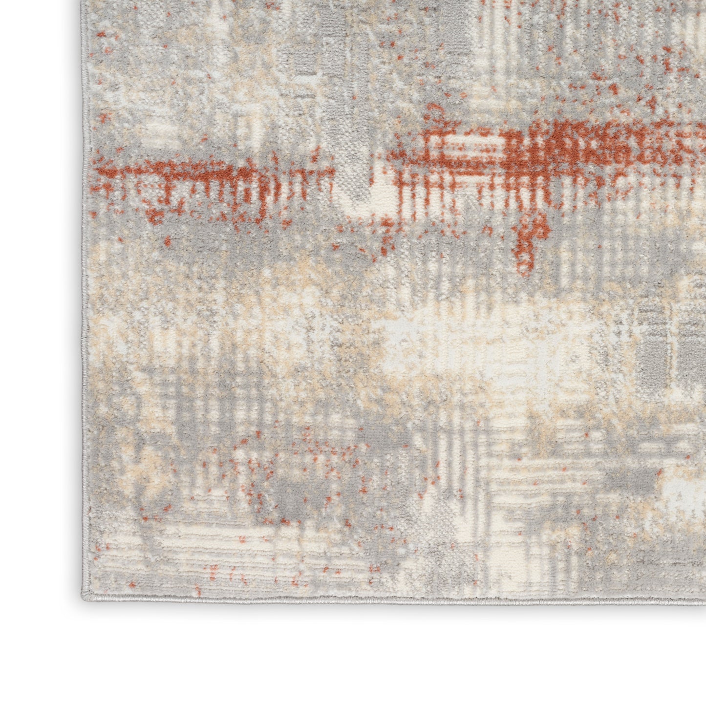 Rectangular textured rug in gray, ivory and rust with an abstract pattern; modern living room rug.