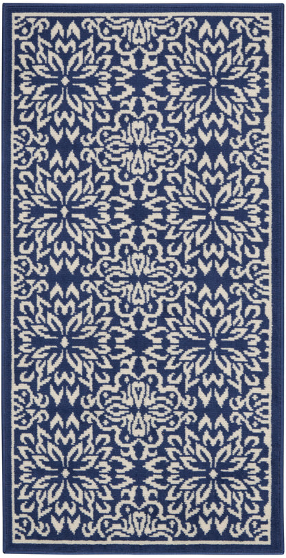 Navy blue rug runner with repeating ivory floral medallions and a navy border.