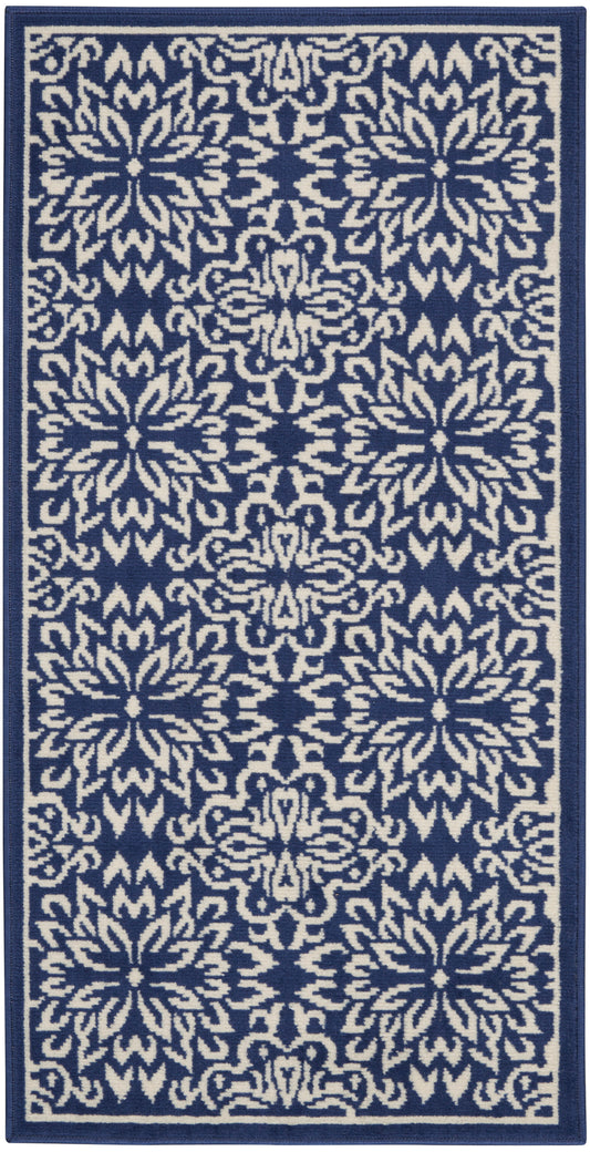 Navy blue rug runner with repeating ivory floral medallions and a navy border.
