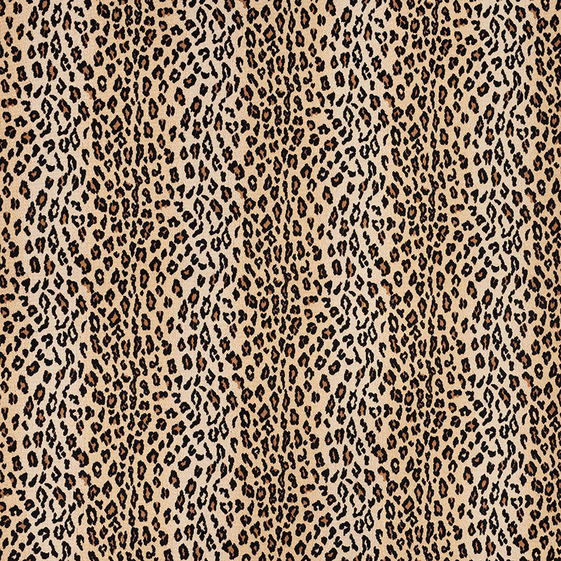 Leopard print fabric pattern in tan and black spots, animal-inspired design for clothing or accessories.