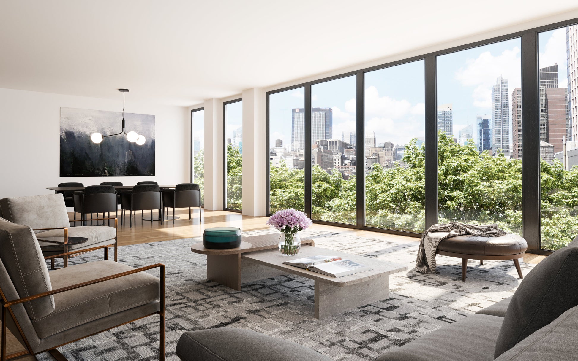Modern open living room with floor-to-ceiling windows and a city skyline view, grey seating, a rug on the floor, and a low concrete coffee table.