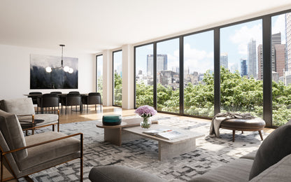Modern open living room with floor-to-ceiling windows and a city skyline view, grey seating, a rug on the floor, and a low concrete coffee table.