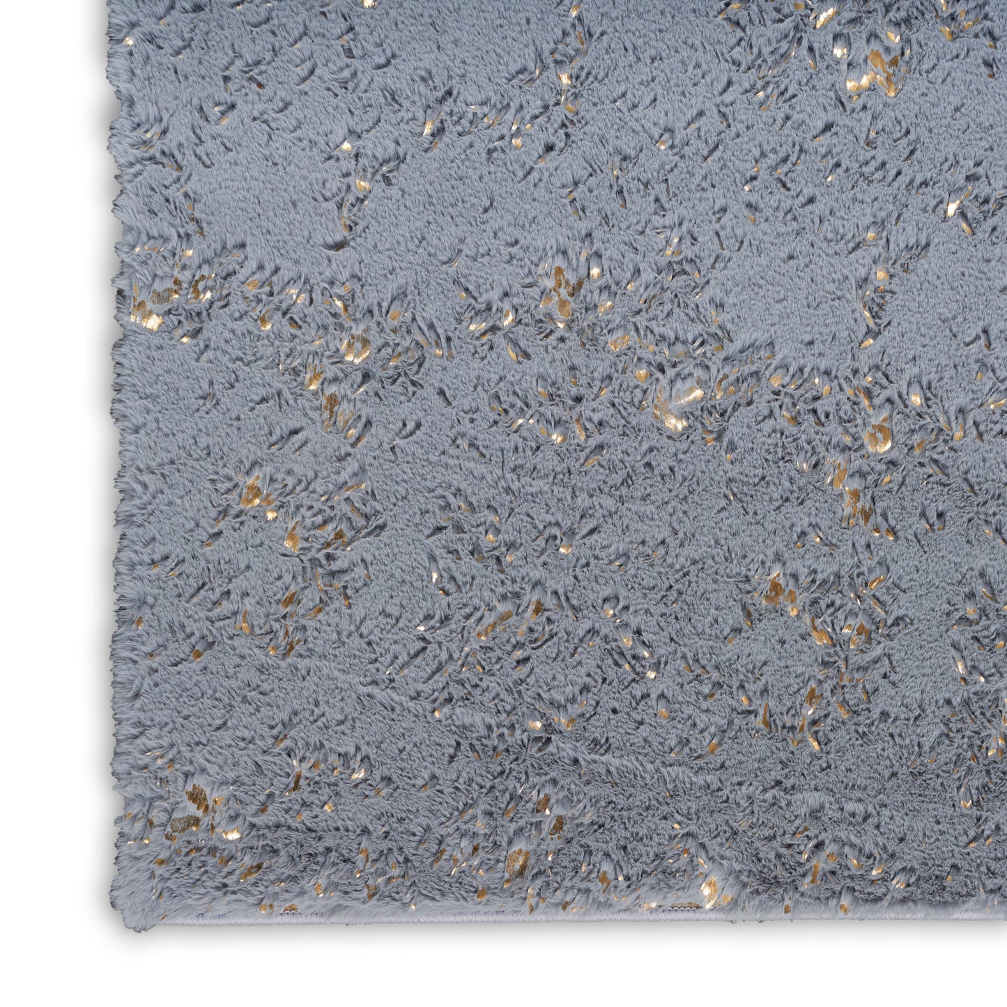 Gray plush shag rug with gold metallic flecks and soft texture, edge visible.
