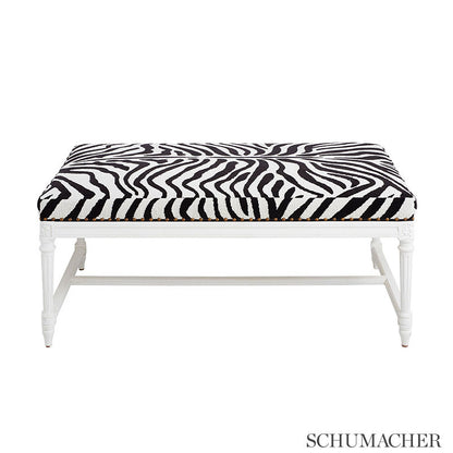 Pattern-woven fabric swatch in java/ivory colorway with zebra-style animal print; high-performance.