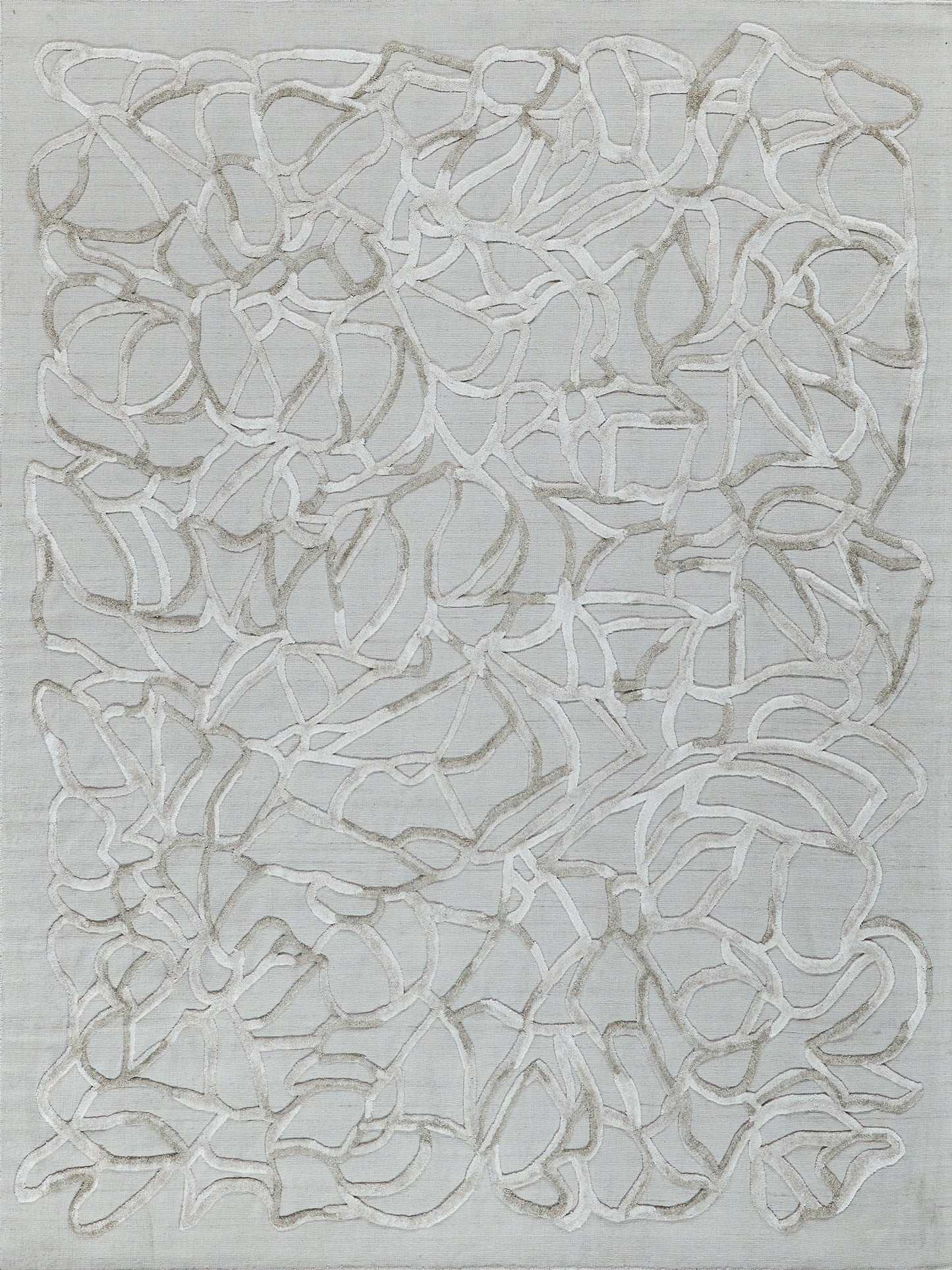 Abstract cream looped-line rug on light gray fabric with raised organic network pattern.