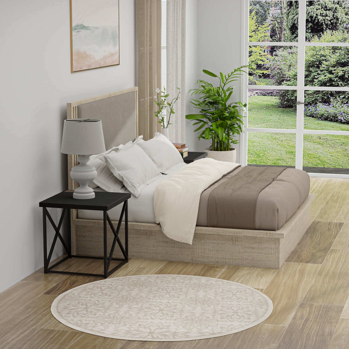 Beige platform bed with white linens, black metal nightstand & lamp, round beige rug, potted plant by large window