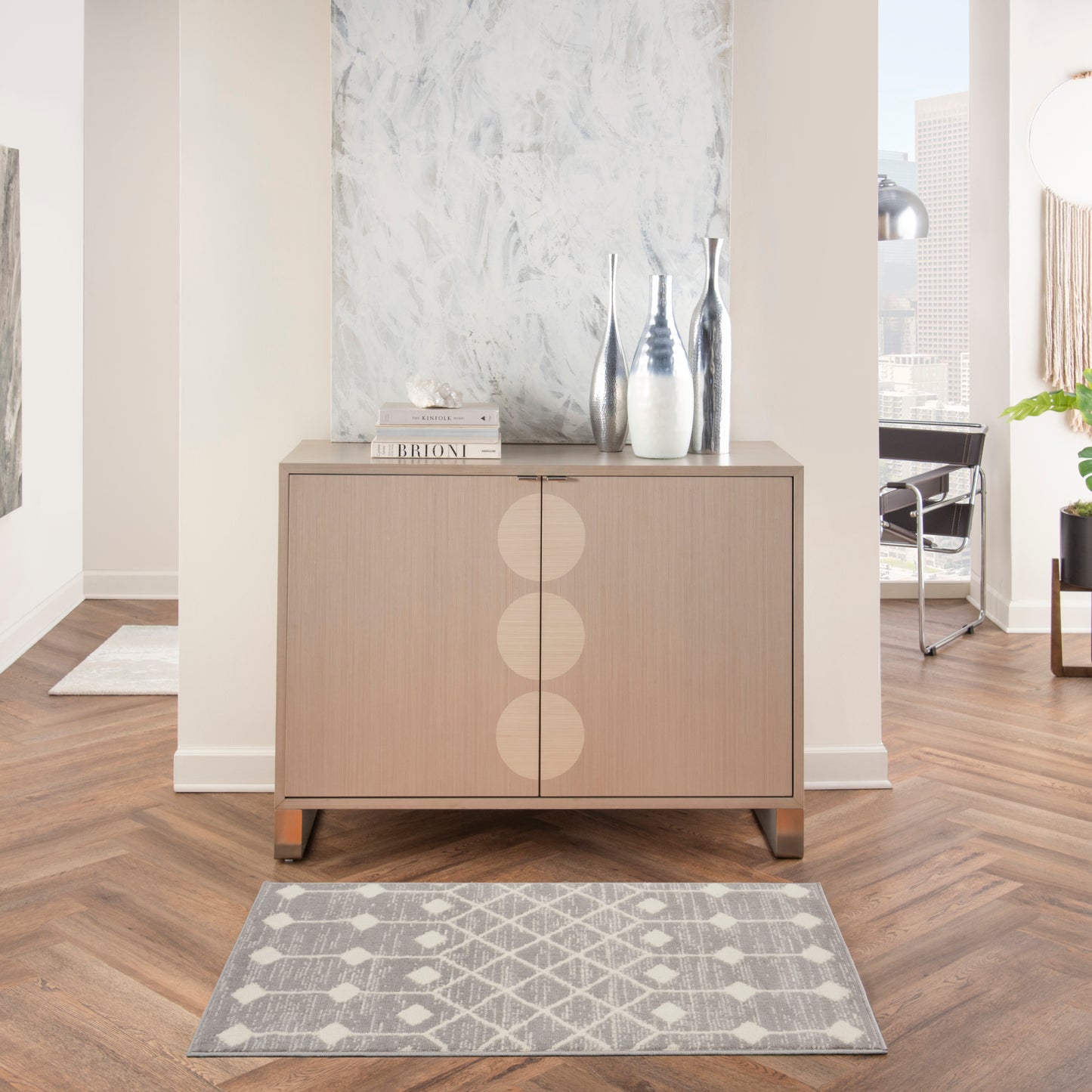 Gray geometric Bohemian rug, 2' x 4'.